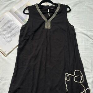 Black Sleeveless Dress with Embellished Neckline